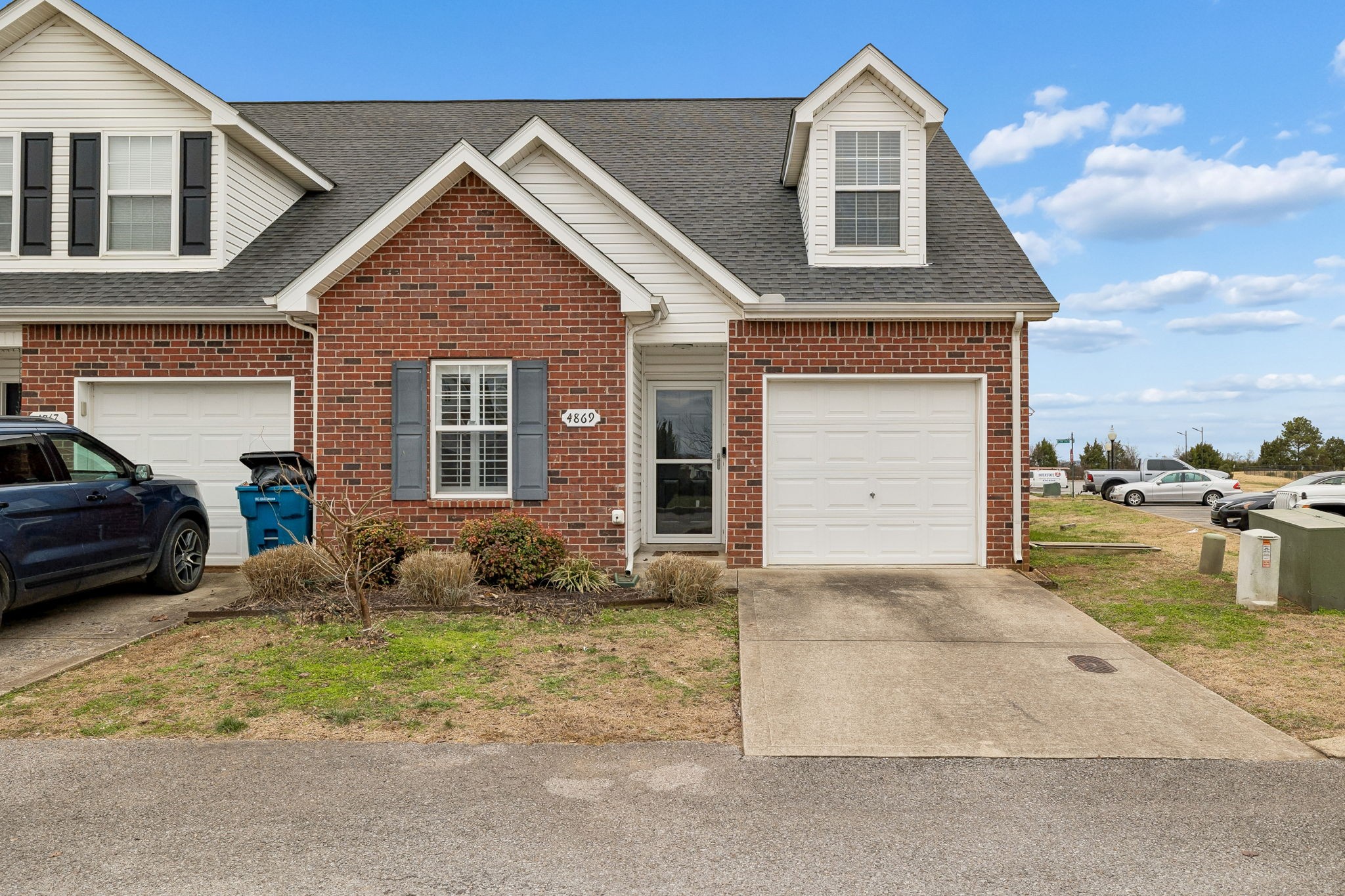 4869 Chelanie Circle Murfreesboro, TN 37129 - Photo 2 of 35 a front view of a house with garden