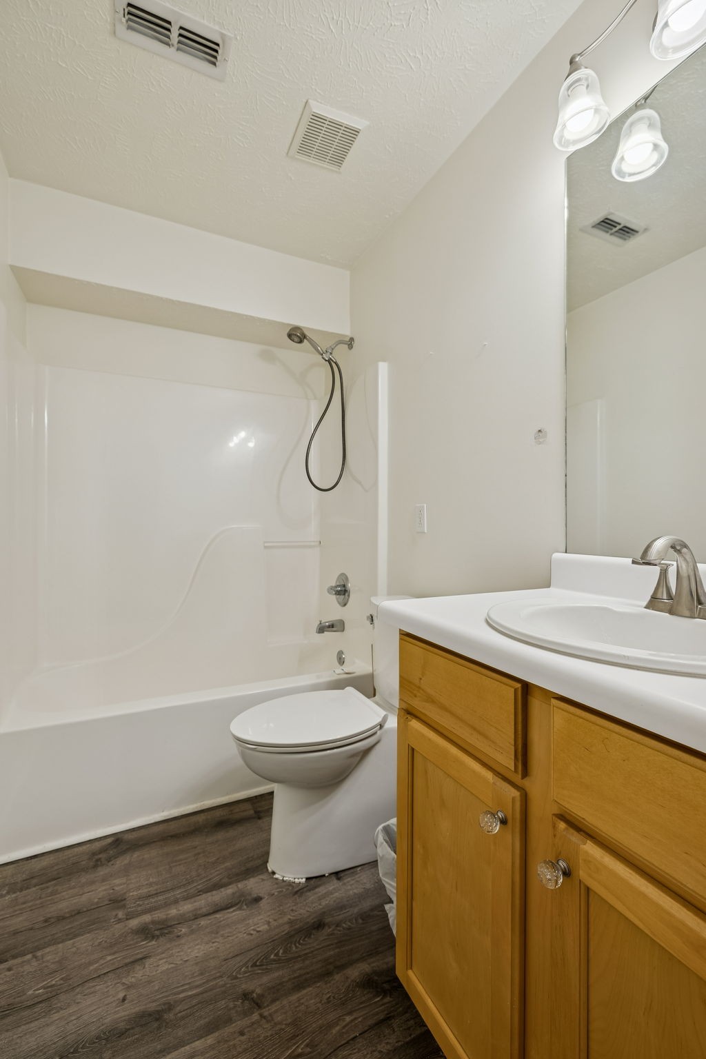 4869 Chelanie Circle Murfreesboro, TN 37129 - Photo 25 of 35 a bathroom with a sink a toilet and shower