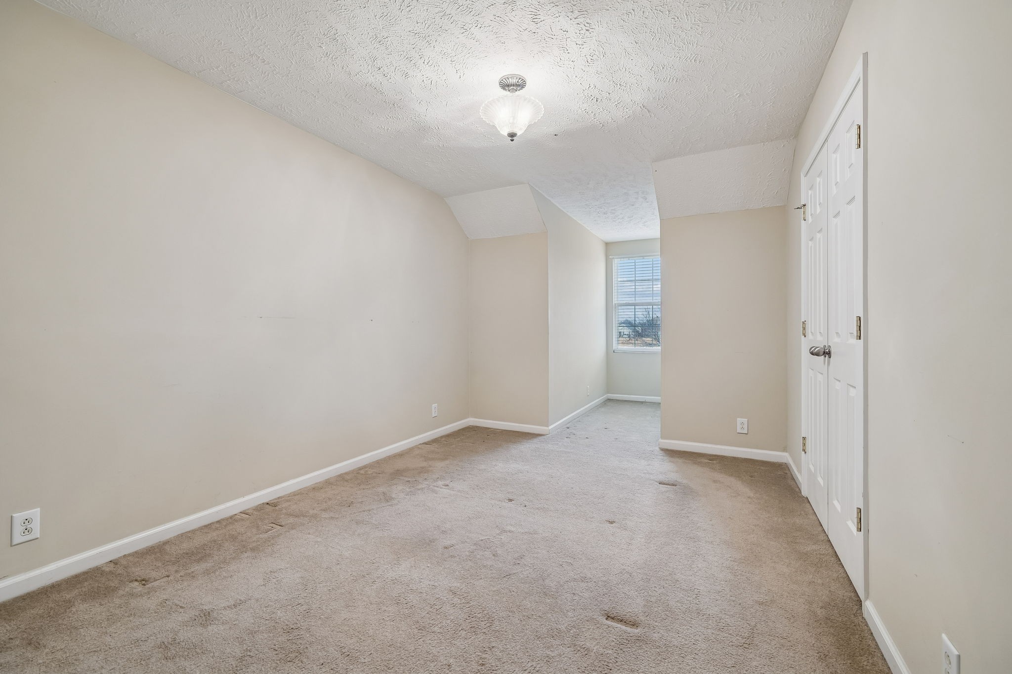 4869 Chelanie Circle Murfreesboro, TN 37129 - Photo 29 of 35 an empty room with an entryway and fan