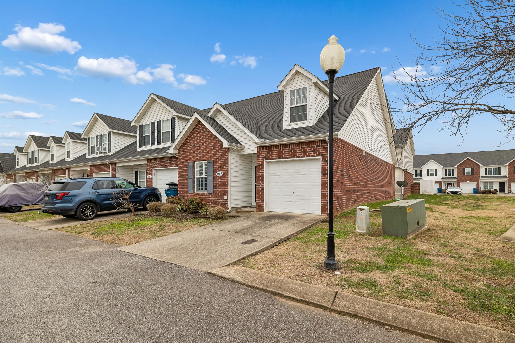 4869 Chelanie Circle Murfreesboro, TN 37129 - Photo 3 of 35 a front view of a house with garden