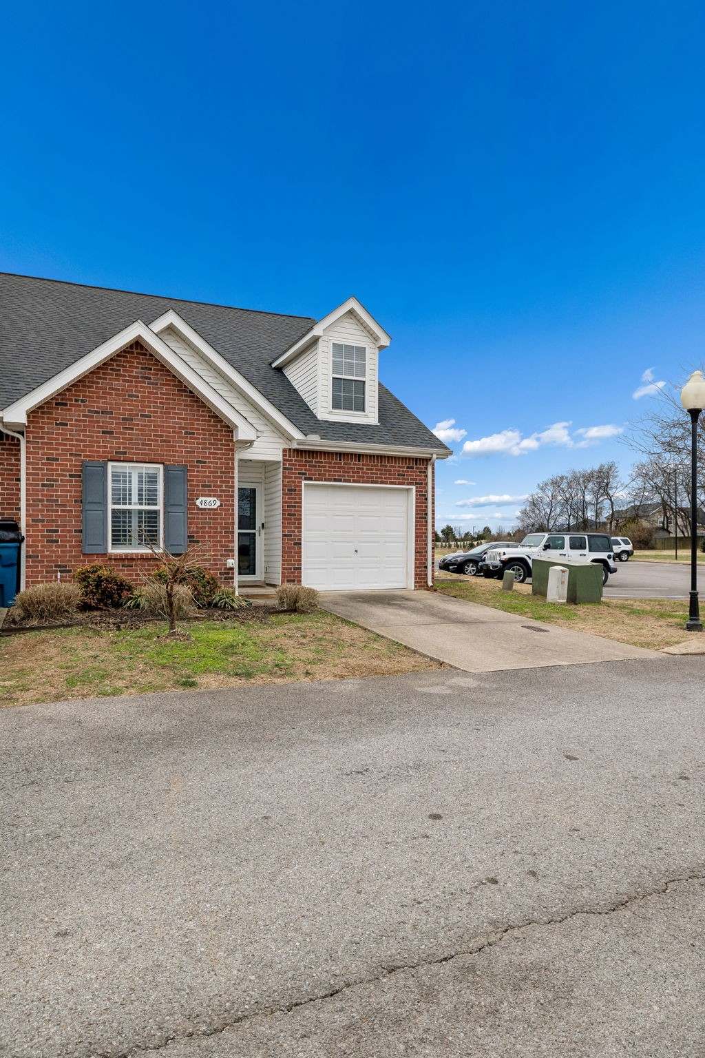 4869 Chelanie Circle Murfreesboro, TN 37129 - Photo 4 of 35 a front view of a house with a yard