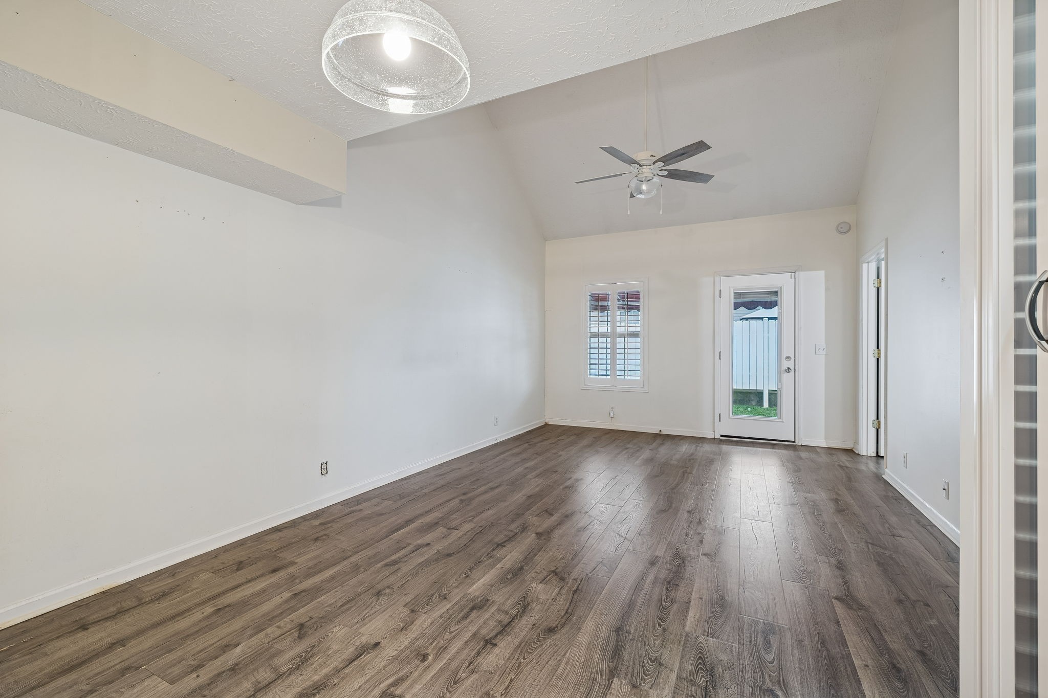 4869 Chelanie Circle Murfreesboro, TN 37129 - Photo 7 of 35 an empty room with wooden floor and windows
