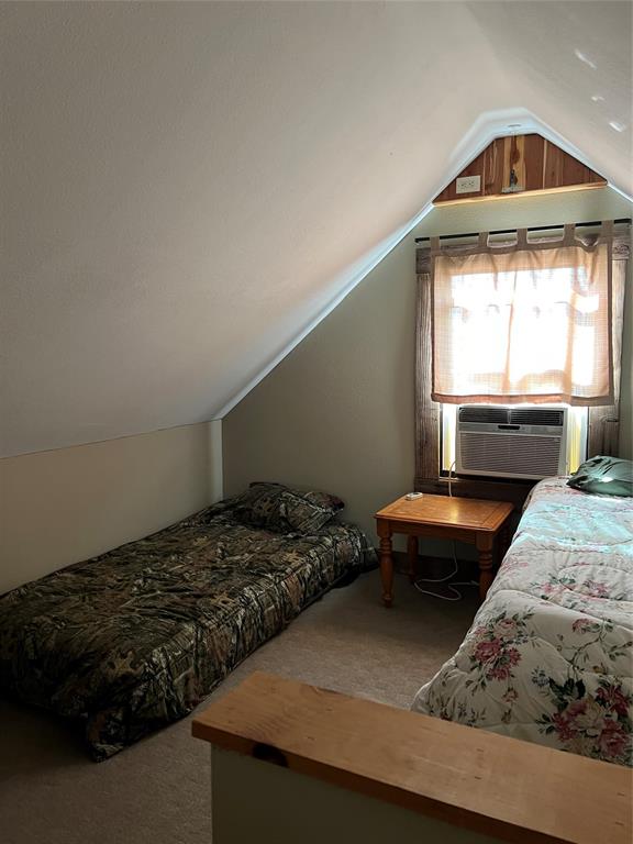 1921 Salt Creek Road Jacksboro, TX 76458 - Photo 20 of 31 a bedroom with bed and window