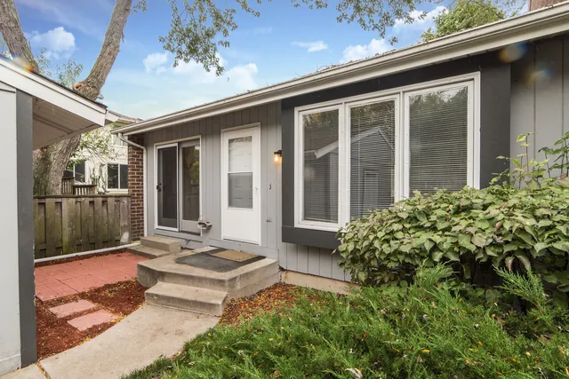 a front view of a house with a porch