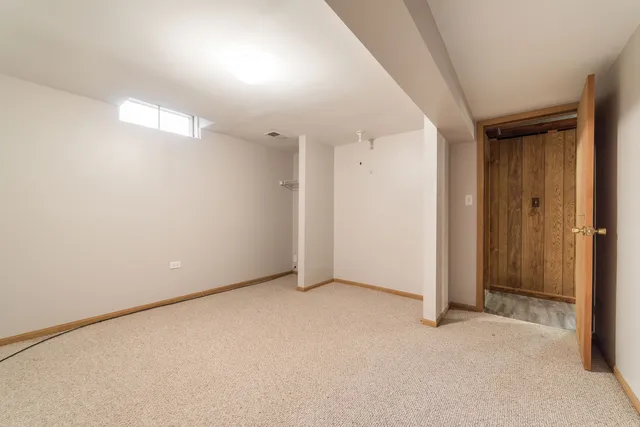 an empty room with entrance door