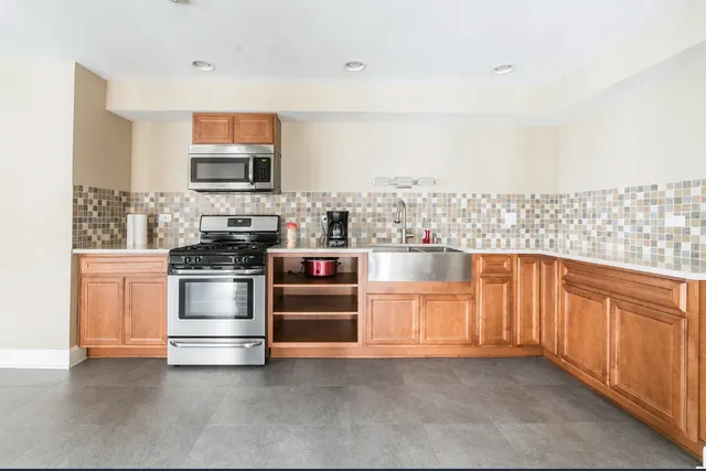 a living room with furniture and a table