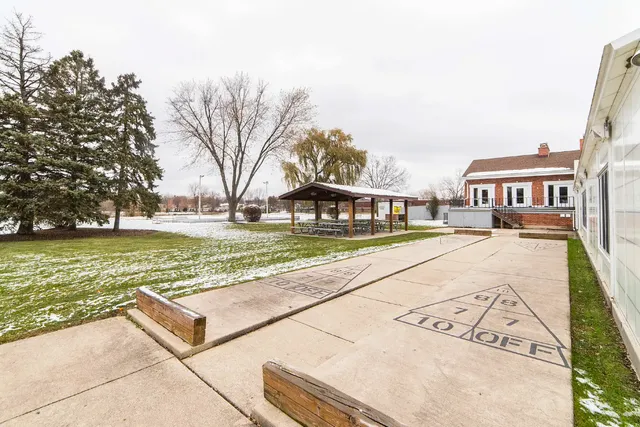a view of a backyard with a snow