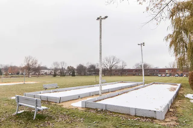 a view of a lake with a yard