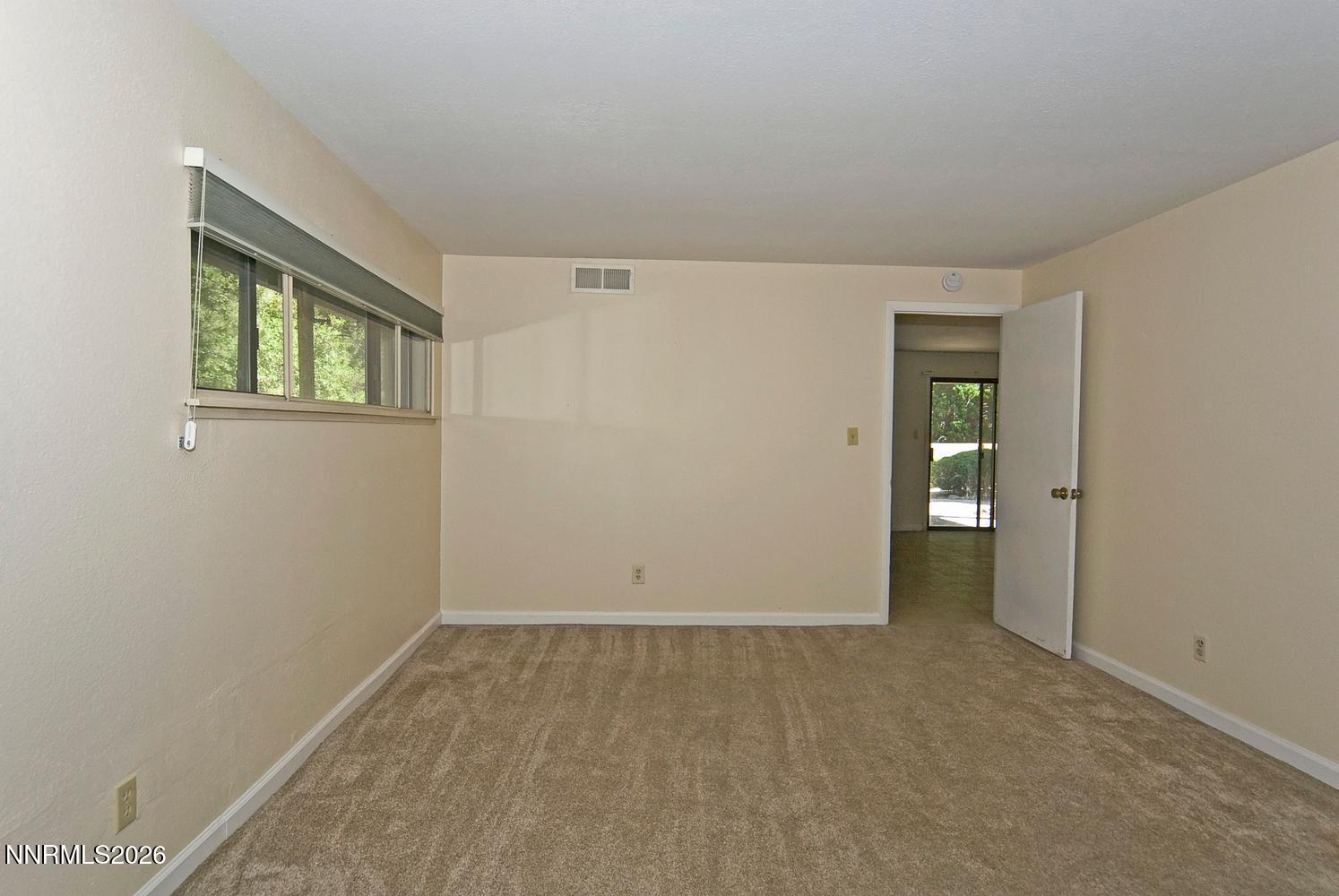 3185 Corey Drive Reno, NV 89509 - Photo 36 of 46 059-051-Downstairs Bedroom 4-1494x1000