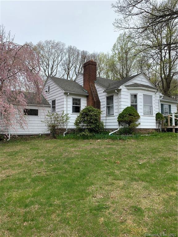 147 Scott Road Prospect, CT 06712 - Photo 1 of 1 a front view of a house with a garden