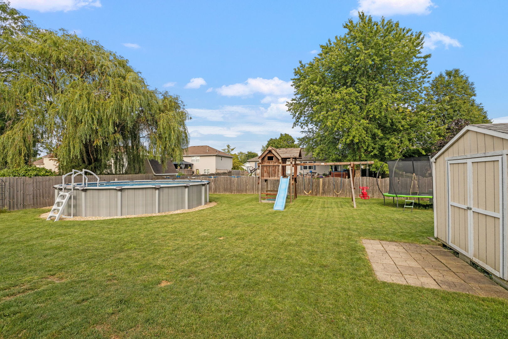 898 Meadowbrook Road Elwood, IL 60421 - Photo 26 of 30 a view of a garden with a slide