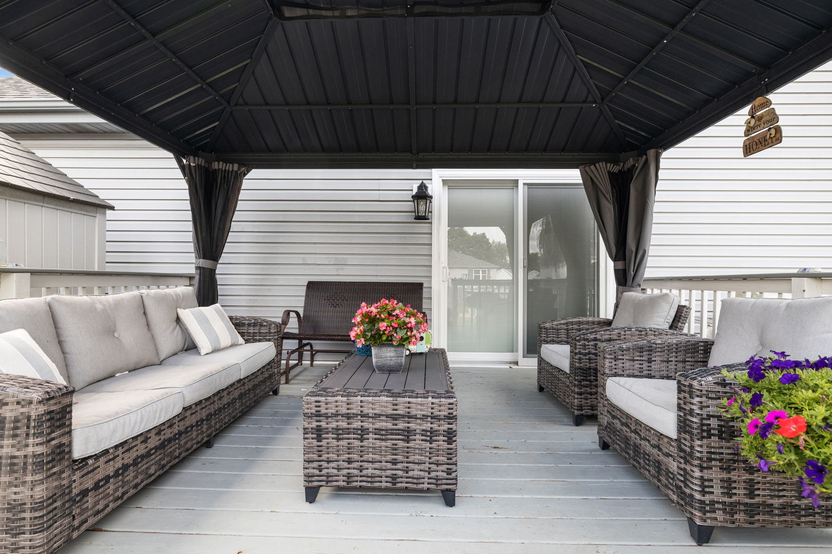 898 Meadowbrook Road Elwood, IL 60421 - Photo 28 of 30 a outdoor living space with patio furniture and a fireplace