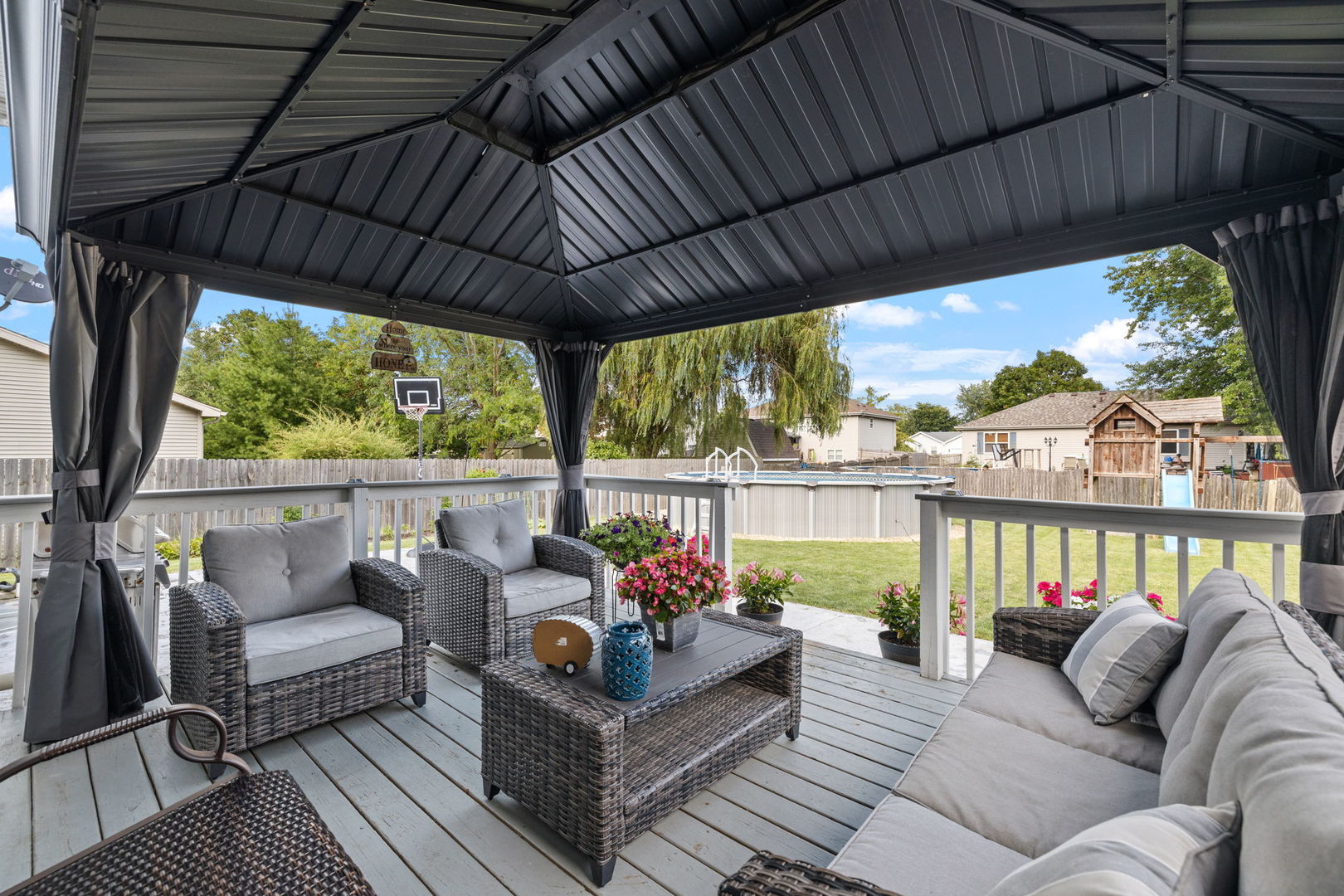 898 Meadowbrook Road Elwood, IL 60421 - Photo 29 of 30 a balcony with furniture and a potted plant