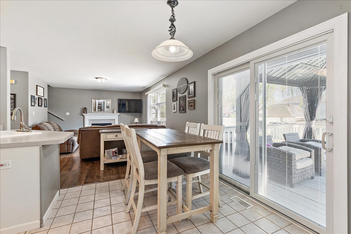 898 Meadowbrook Road Elwood, IL 60421 - Photo 6 of 30 a view of a dining room with furniture