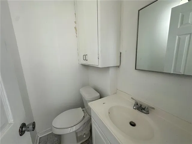 a bathroom with a sink and a toilet