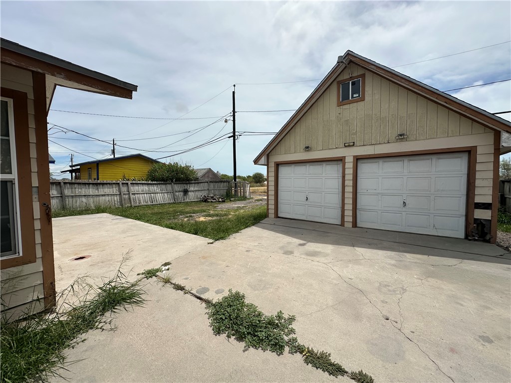 113 Lee Avenue Gregory, TX 78374 - Photo 22 of 22 a view of a house with a yard