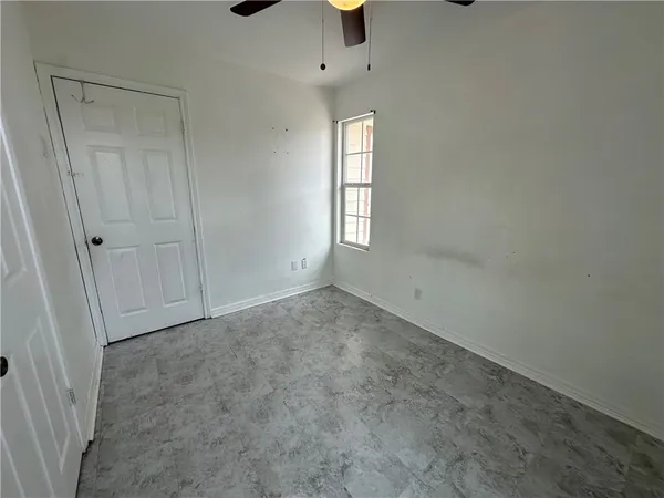 an empty room with windows