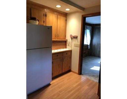108 Woodland Road Springfield, MA 01129 - Photo 3 of 12 a kitchen with a refrigerator and a sink