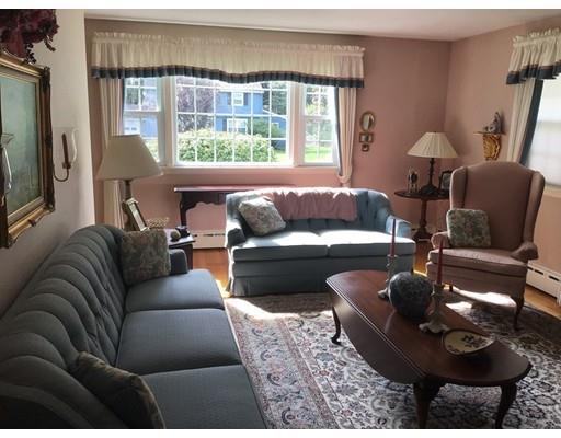 108 Woodland Road Springfield, MA 01129 - Photo 7 of 12 a living room with furniture and a large window