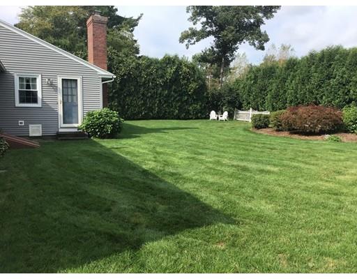 108 Woodland Road Springfield, MA 01129 - Photo 10 of 12 a front view of a house with a yard
