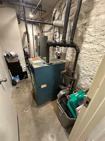 a view of a brick house with many windows