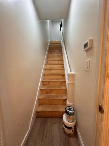 a kitchen with stainless steel appliances a stove a refrigerator and a sink