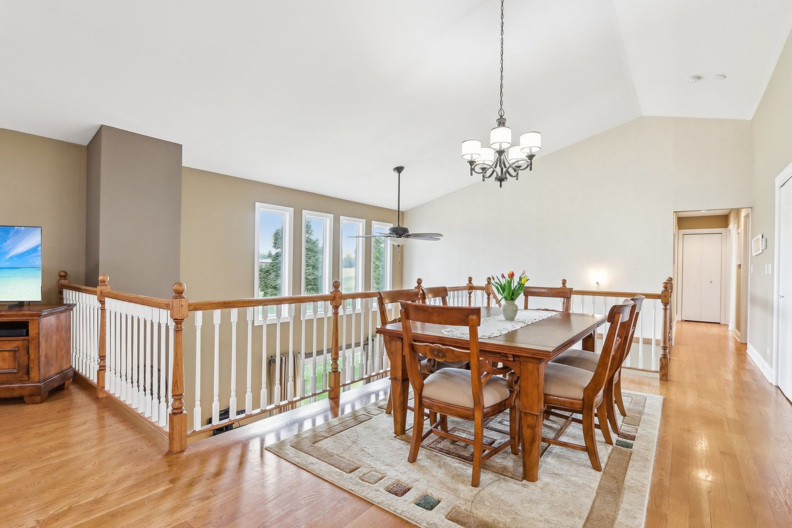 34550 Stanley Road Ingleside, IL 60041 - Photo 13 of 45 a view of a dining room with furniture wooden floor and chandelier