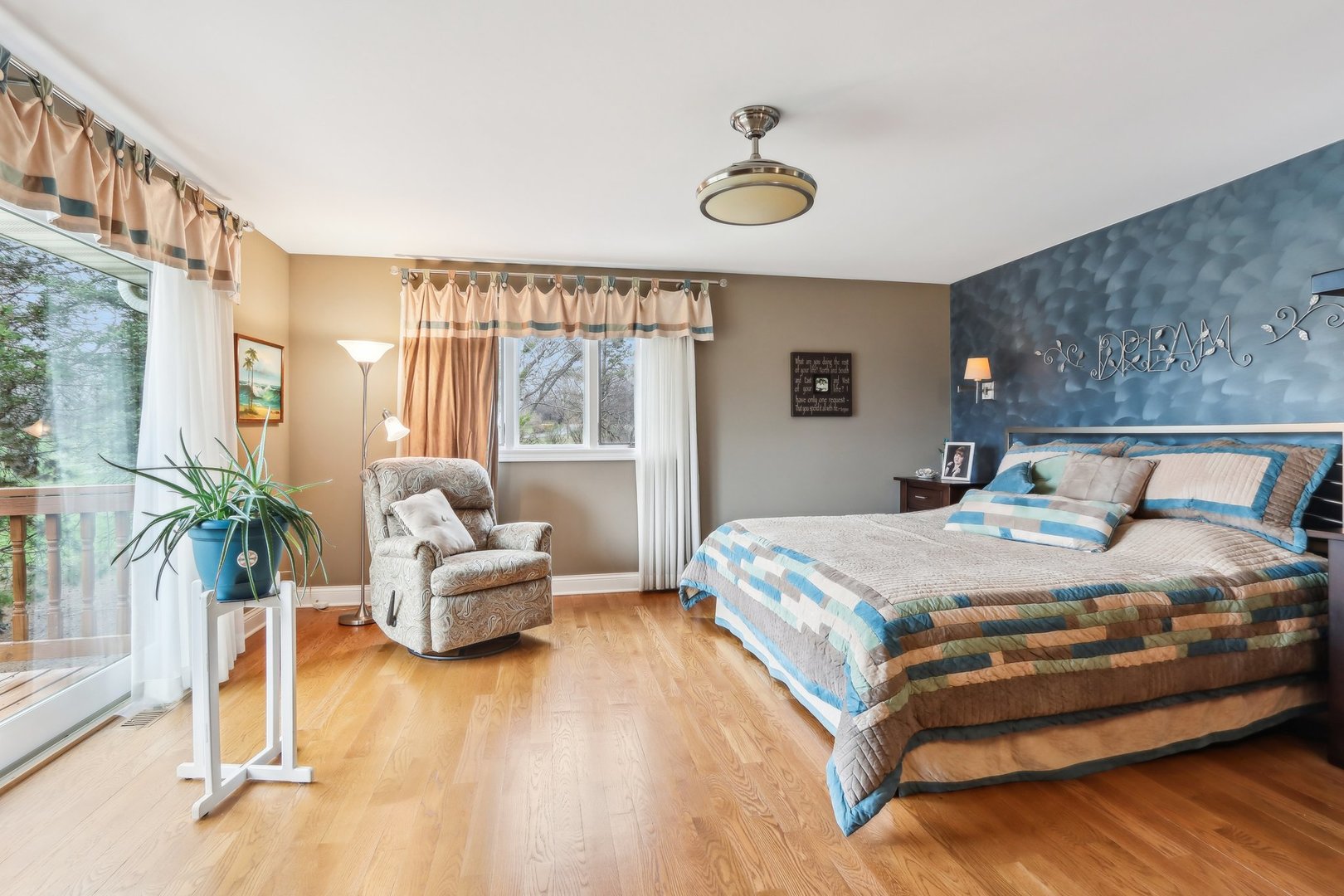 34550 Stanley Road Ingleside, IL 60041 - Photo 15 of 45 a bedroom with a bed and wooden floor