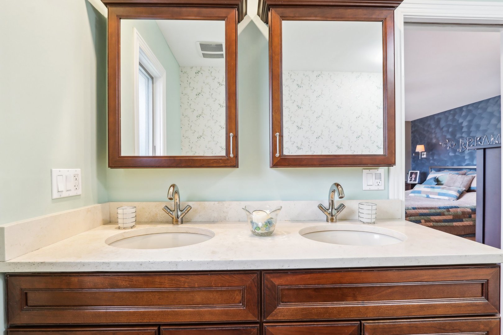 34550 Stanley Road Ingleside, IL 60041 - Photo 17 of 45 a bathroom with double vanity sinks and a mirror