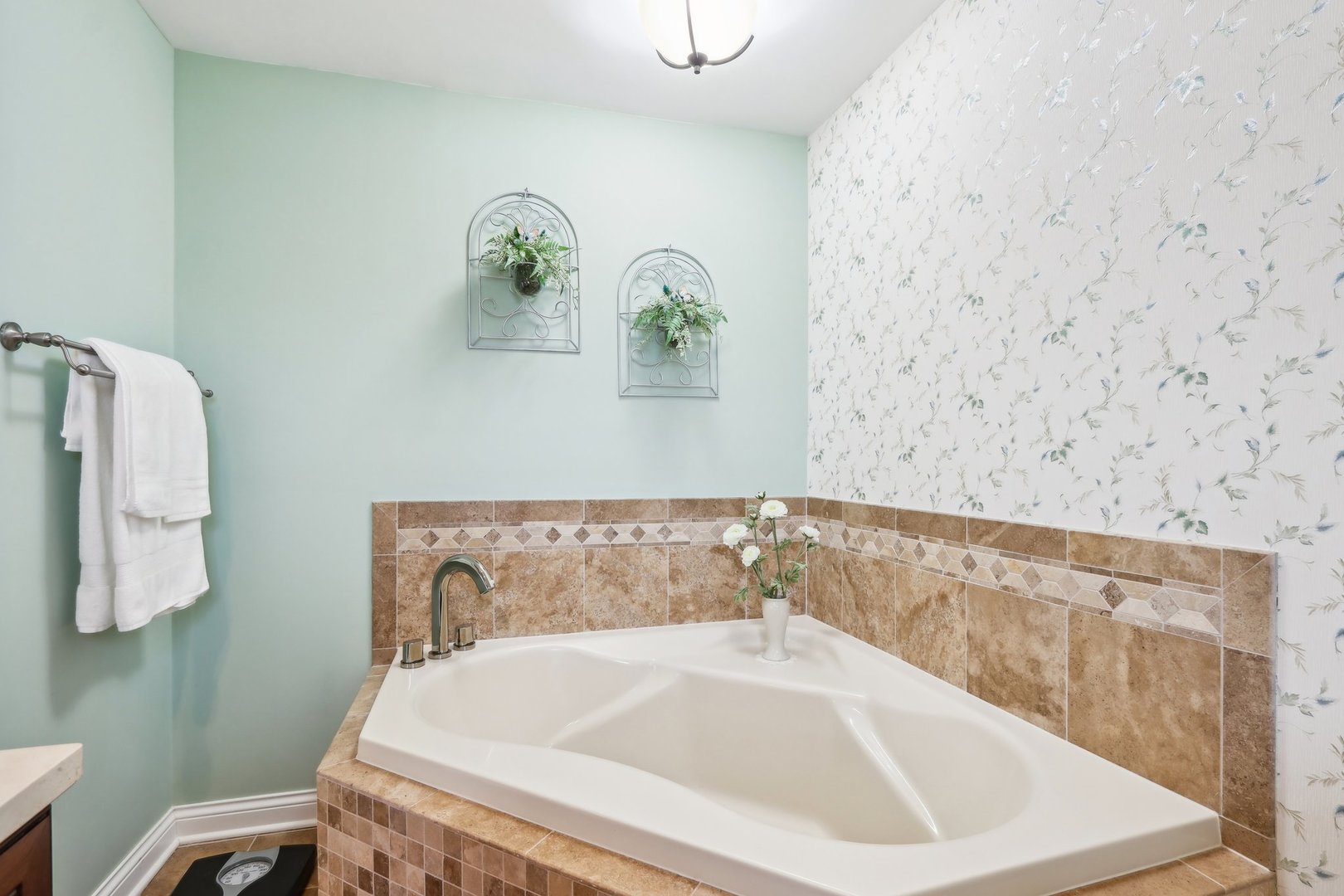 34550 Stanley Road Ingleside, IL 60041 - Photo 18 of 45 a bath tub sitting next to a white sink and vanity