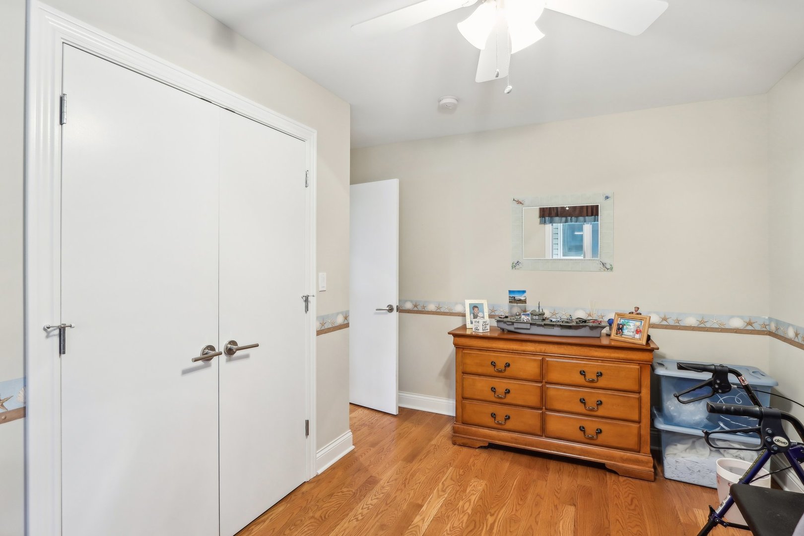 34550 Stanley Road Ingleside, IL 60041 - Photo 22 of 45 a room with a dresser and a mirror