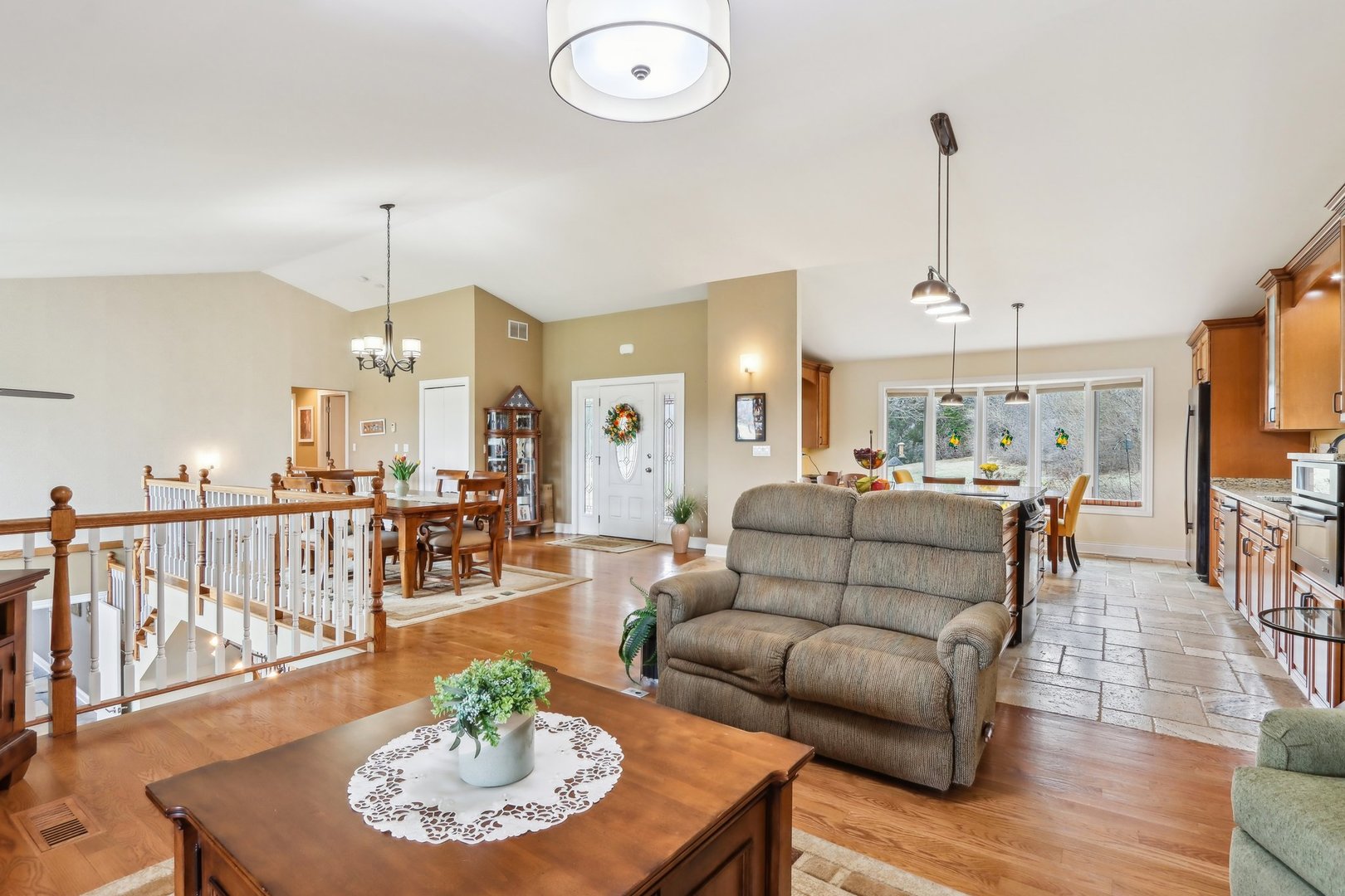 34550 Stanley Road Ingleside, IL 60041 - Photo 3 of 45 a living room with furniture kitchen view and a chandelier
