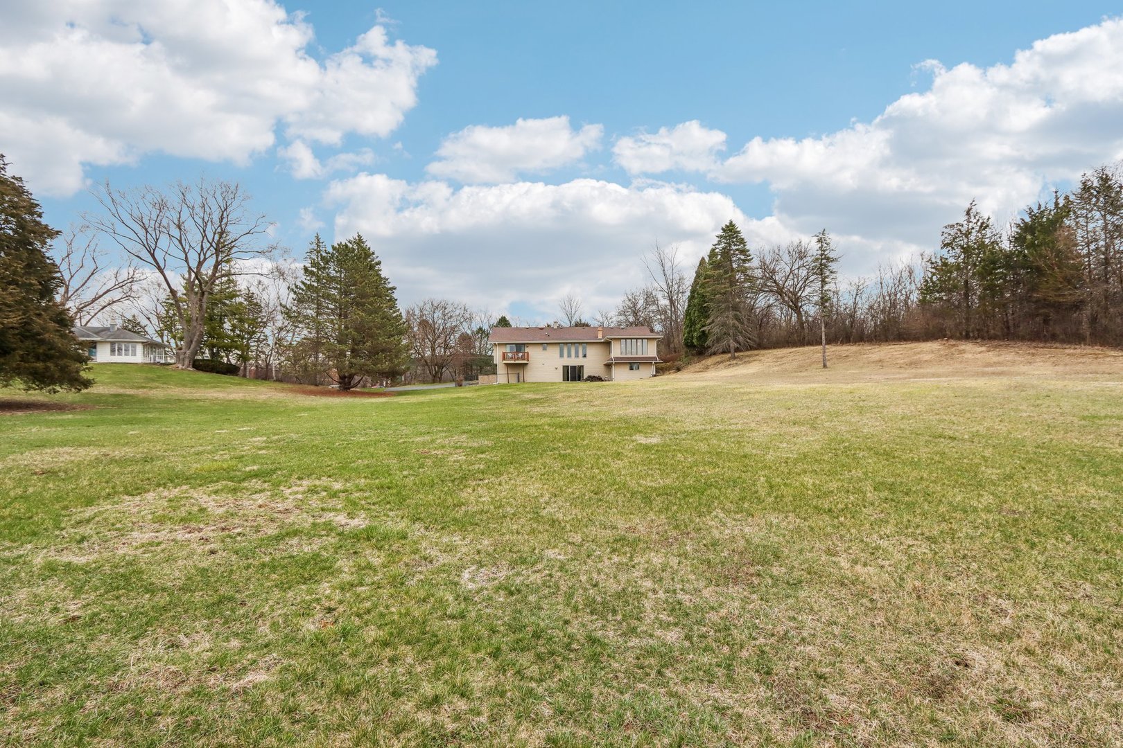 34550 Stanley Road Ingleside, IL 60041 - Photo 34 of 45 a view of a field with an trees in front of it