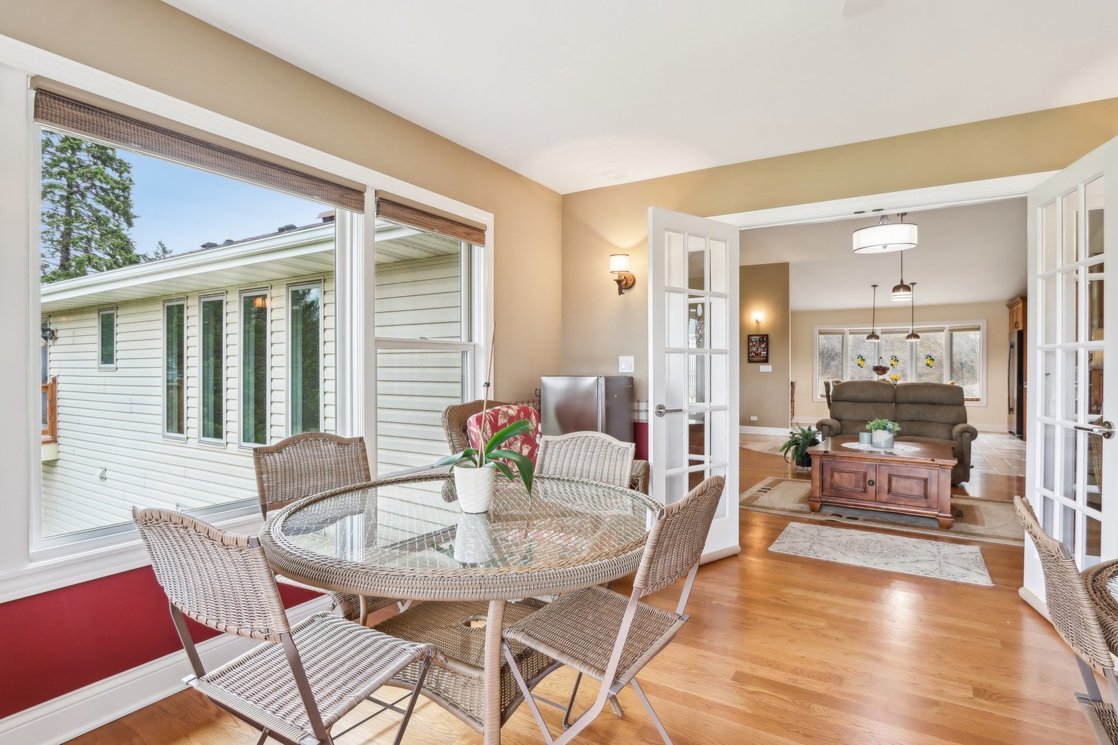 34550 Stanley Road Ingleside, IL 60041 - Photo 7 of 45 a view of a dining room with furniture and wooden floor