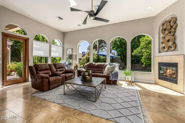 a dining room with furniture and window