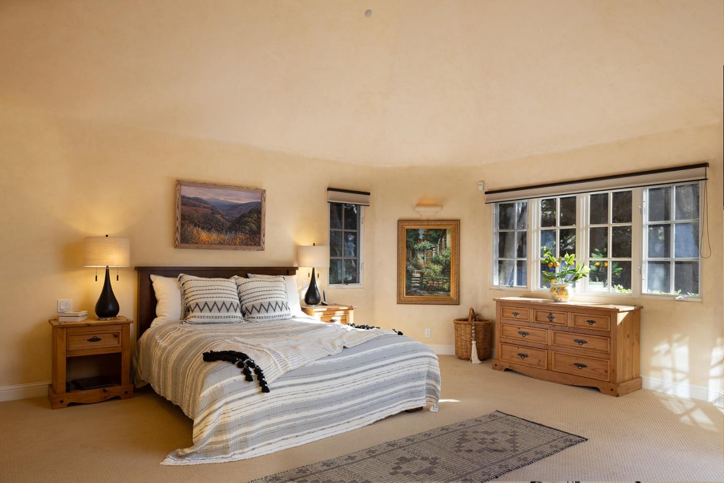 8680 River Meadows Road Carmel, CA 93923 - Photo 20 of 38 a bedroom with a bed and a window