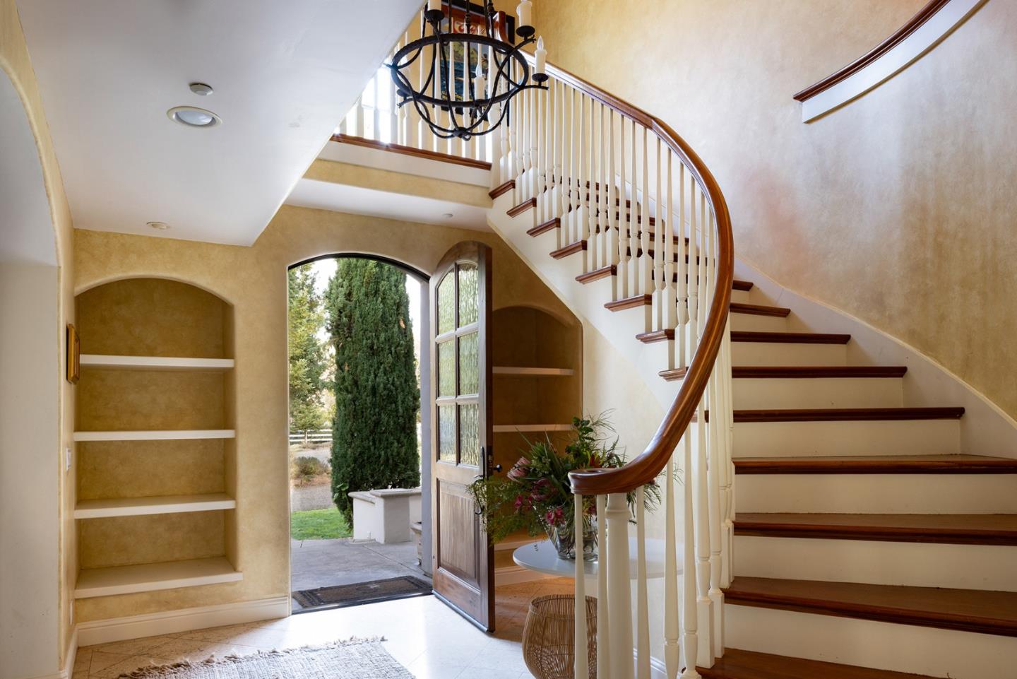 8680 River Meadows Road Carmel, CA 93923 - Photo 23 of 38 a view of staircase with white walls and a window