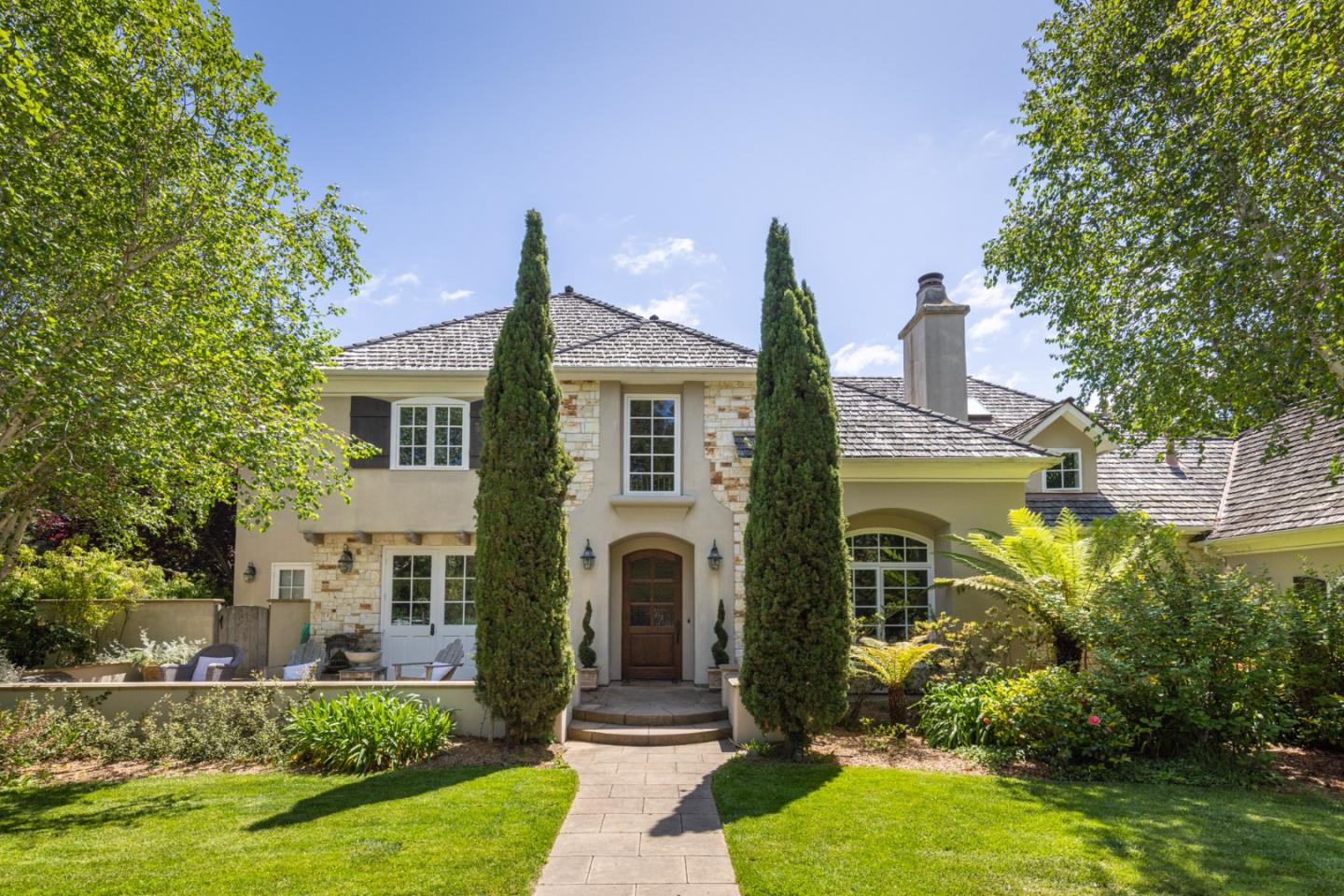 8680 River Meadows Road Carmel, CA 93923 - Photo 4 of 38 a front view of a house with a yard