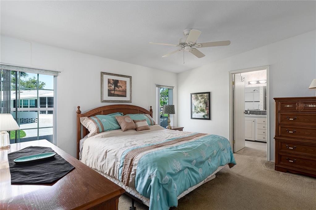 8012 Nancy Lane Ellenton, FL 34222 - Photo 15 of 28 a bedroom with a bed and window