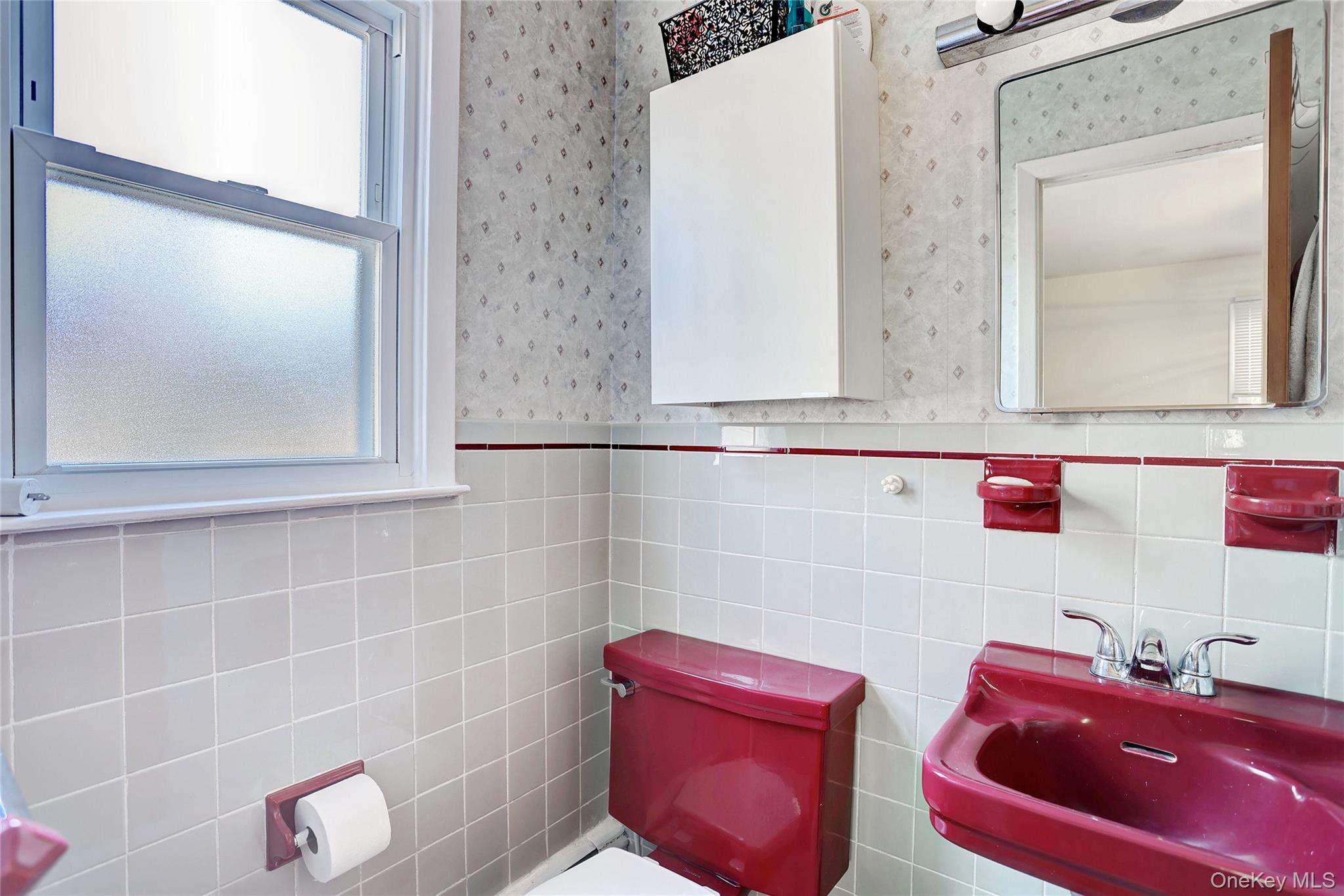 160 Pascack Road Chestnut Ridge, NY 10965 - Photo 10 of 25 a bathroom with a sink mirror and vanity