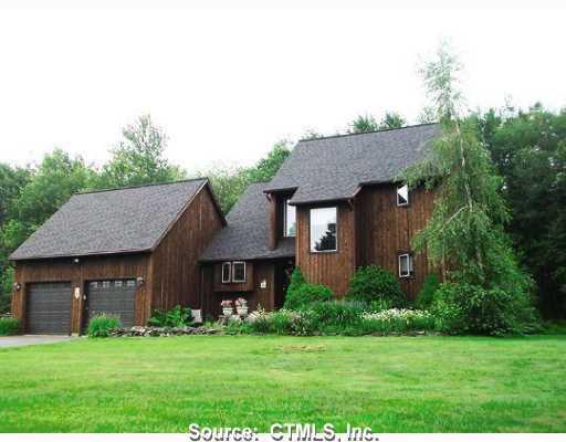 118 Rossi Road Torrington, CT 06790 - Photo 1 of 1 a front view of a house with a garden