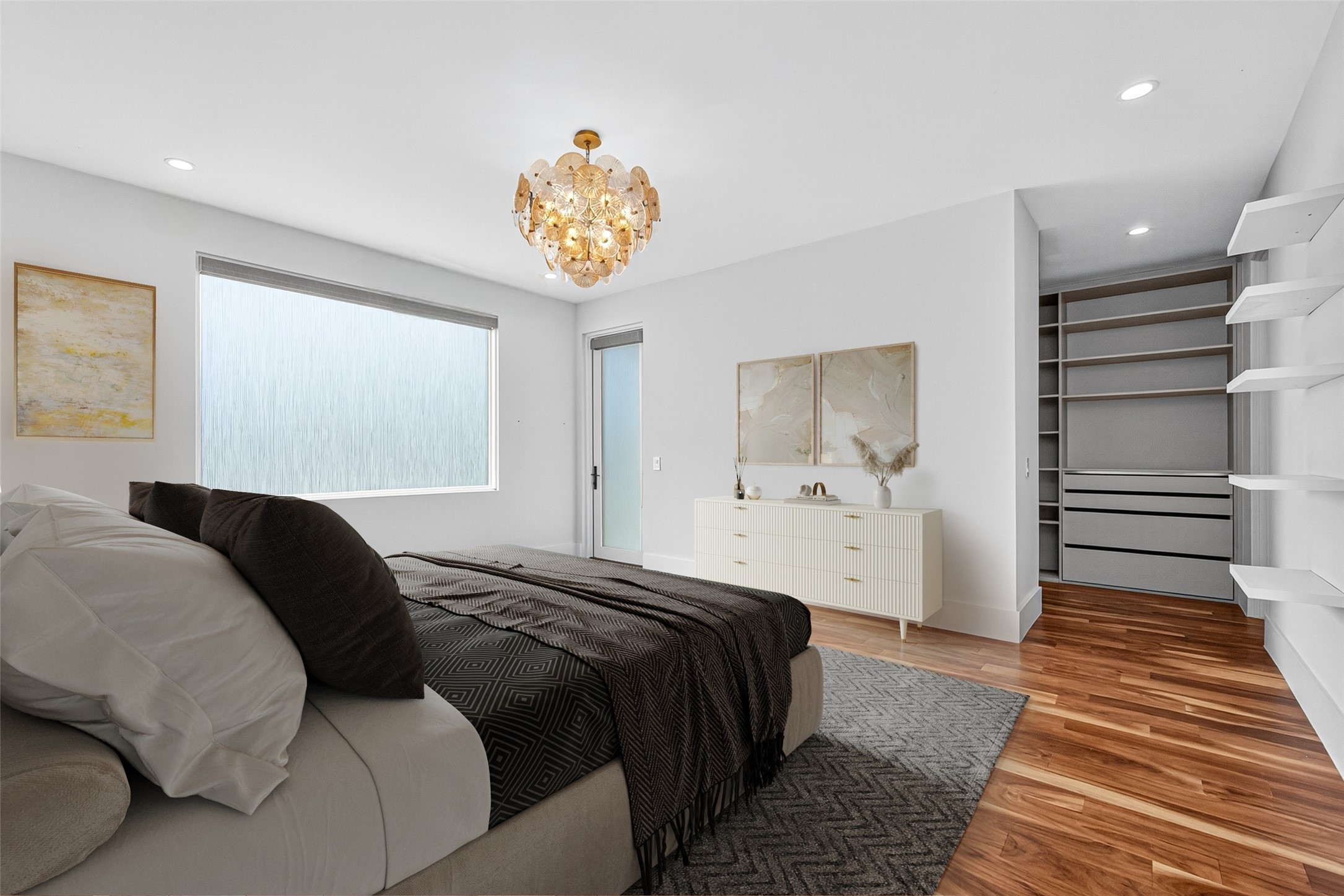 211 Stratford Street Houston, TX 77006 - Photo 19 of 33 a bedroom with a bed and a chandelier