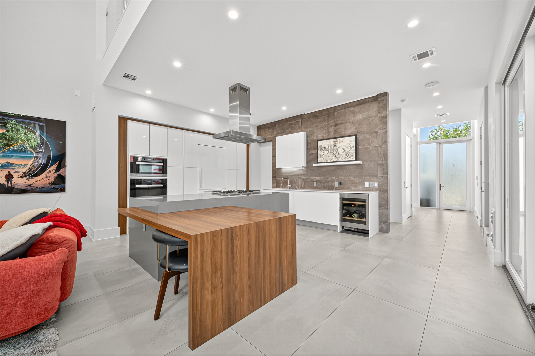 211 Stratford Street Houston, TX 77006 - Photo 5 of 33 a kitchen with stainless steel appliances granite countertop a refrigerator and a sink