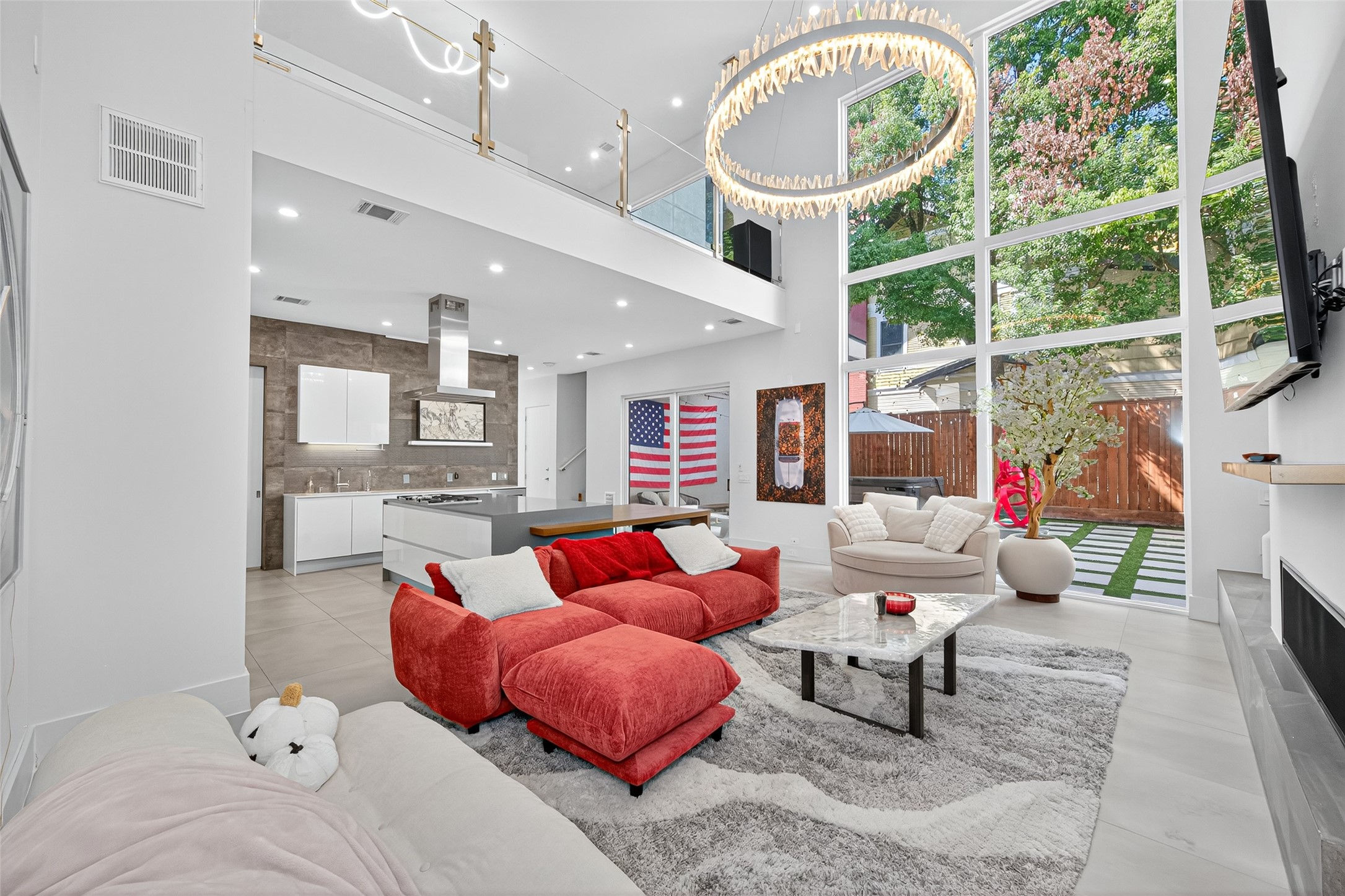211 Stratford Street Houston, TX 77006 - Photo 9 of 33 a living room with furniture and a large window