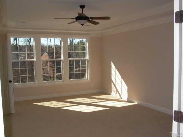 2204 Clayette Court Raleigh, NC 27612 - Photo 8 of 10 Large bonus/multi-purpose room. Can be a 5th bdrm, media room, exercise room or studio. Your choice:) This room has 2 closets. It is at the rear of the home overlooking the outdoor living space.