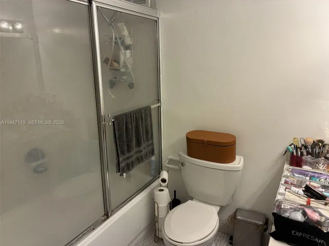 a view of kitchen with table and chairs