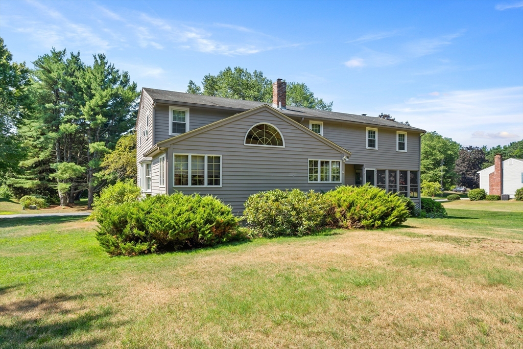 40 Saw Mill Road Stow, MA 01775 - Photo 2 of 42 a front view of a house with garden