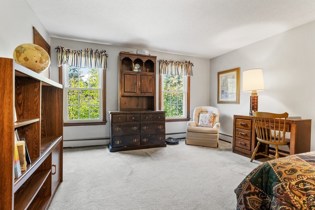 40 Saw Mill Road Stow, MA 01775 - Photo 32 of 42 a bedroom with furniture and a window