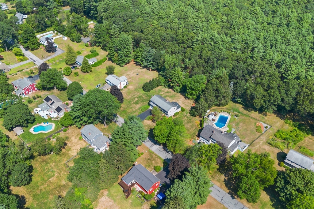 40 Saw Mill Road Stow, MA 01775 - Photo 38 of 42 an aerial view of residential house with outdoor space and trees all around