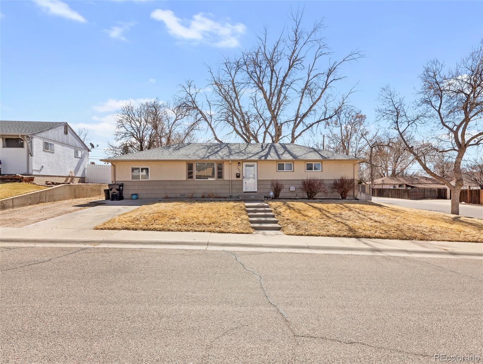 1802 Comanche Road Pueblo, CO 81001 - Photo 24 of 25 a view of road with large house